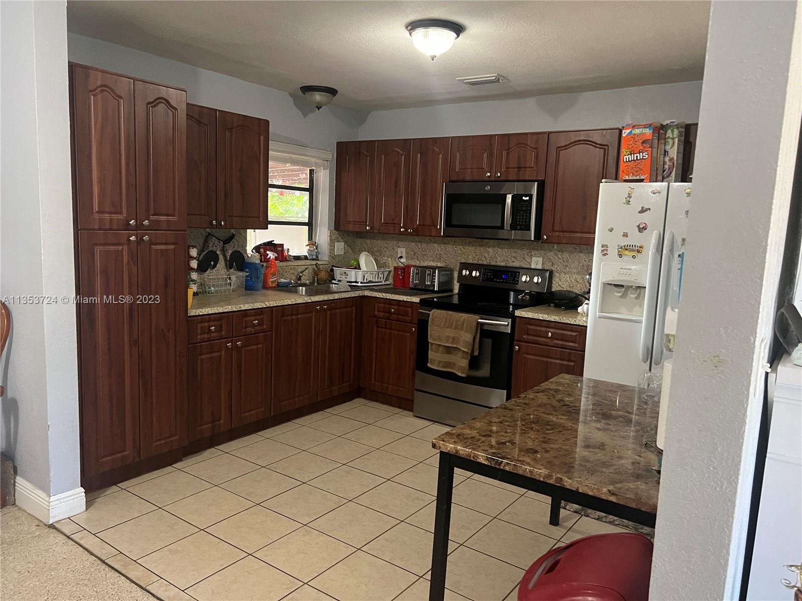 Photo 2 of 20 of 4410 NW 173rd Dr house