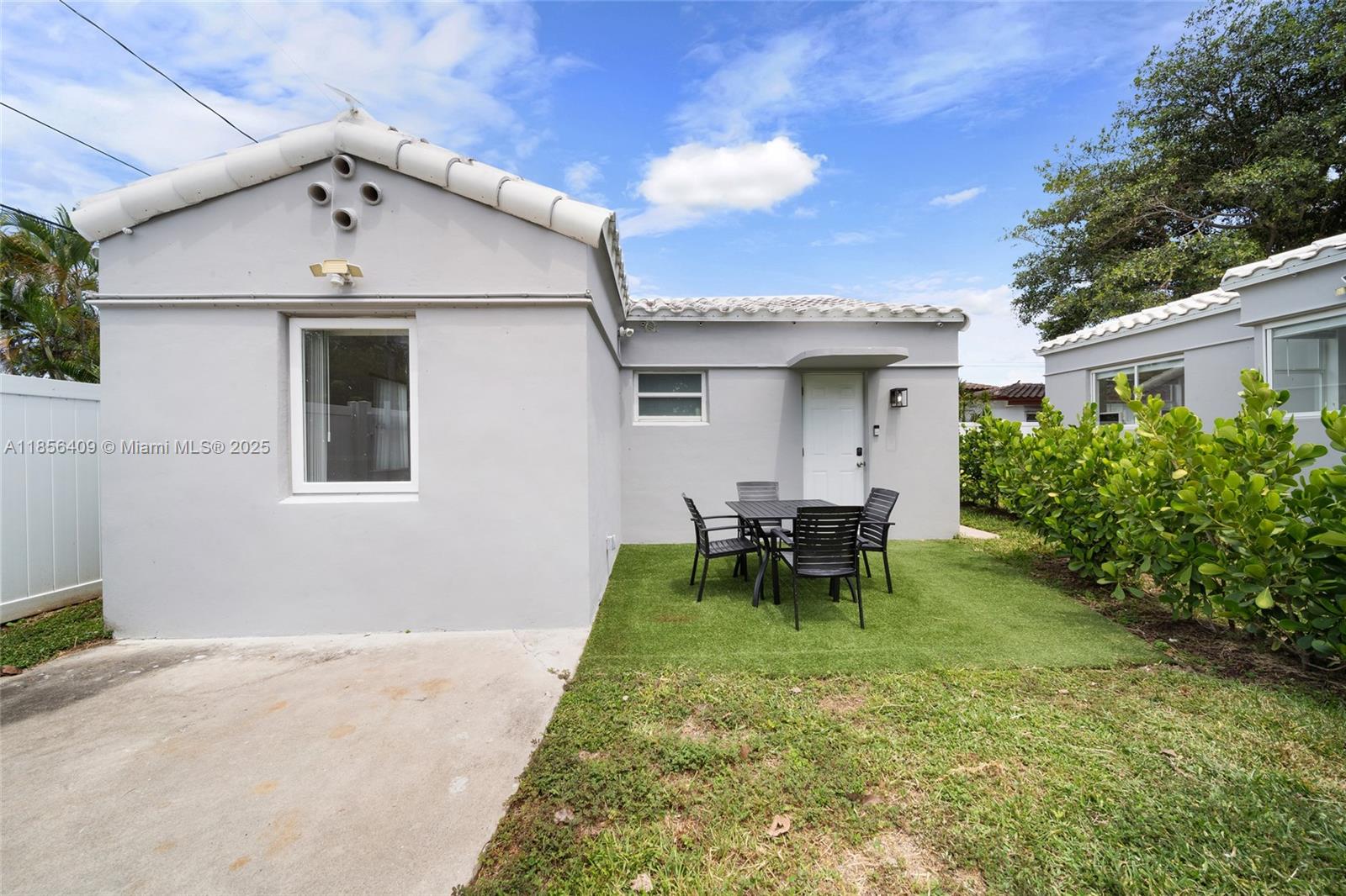Updated 2 bedroom, 1 bath home! COMPLETELY REDONE on the ICONIC Hollywood Blvd only a mile from HOLLYWOOD BEACH and BOARDWALK!. Impact Windows, NEW Roof, New Kitchen, New Baths, New Flooring etc. 2 car driveway! Only two blocks to Young Circle, groceries, shopping and the nightlife of downtown Hollywood. Available Immediately. A must see!