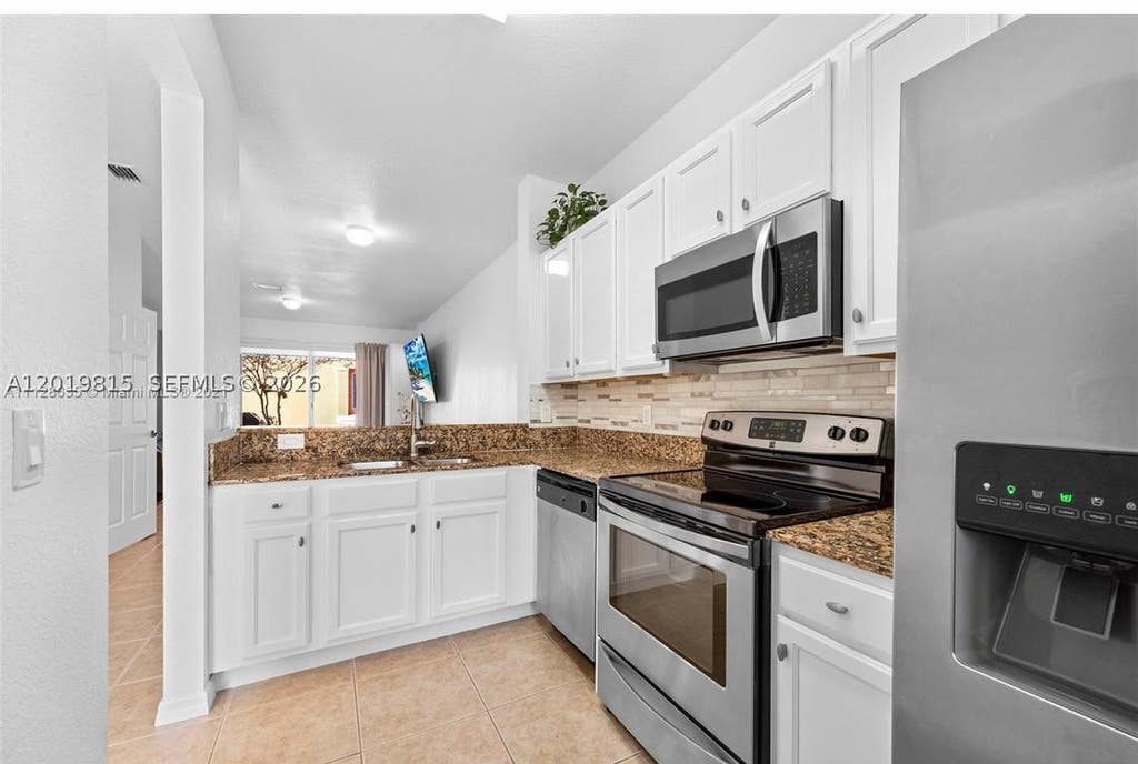 Photo of 1820 SW 89th Ter, Miramar, FL 33025 (MLS # A12019815)