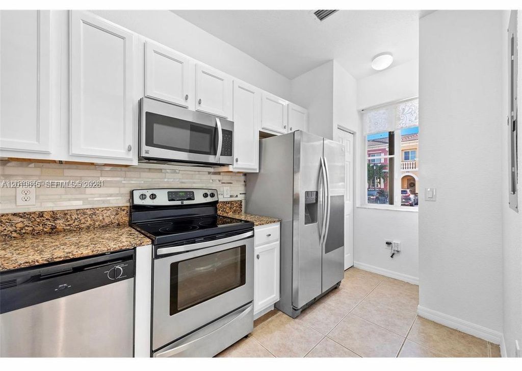 Photo of 1820 SW 89th Ter, Miramar, FL 33025 (MLS # A12019815)