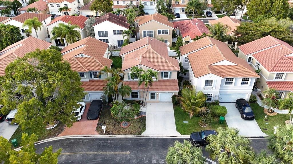 Photo of 10840 NW 46th Dr, Coral Springs, FL 33076 (MLS # A11979353)