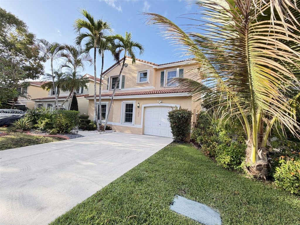 Photo of 10840 NW 46th Dr, Coral Springs, FL 33076 (MLS # A11979353)