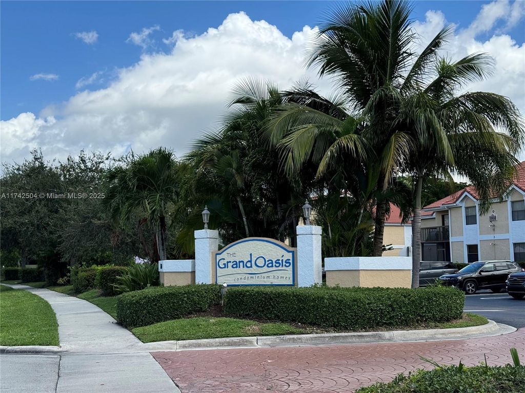 Photo of 5801 Riverside Dr #202B3, Coral Springs, FL 33067 (MLS # A11742504)