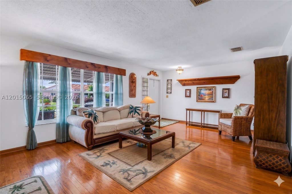 Photo of 4605 NW 47th Ct, Tamarac, FL 33319 (MLS # A12015065)