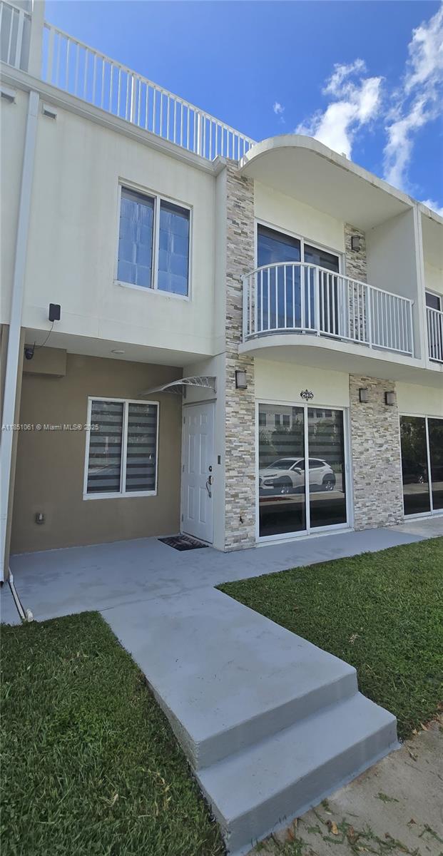 Spacious 4BD/3BA townhouse in a great Homestead location, just minutes from the Turnpike, US-1, schools, shopping centers, and Homestead Baptist Hospital. Built in 2021, this home features one full bedroom and bathroom on the first floor, perfect for guests or multigenerational living. The kitchen includes quartz countertops and stainless steel appliances. Enjoy private terrace, 2 assigned parking spaces, plenty of guest parking, and a low HOA. Built with solid concrete and impact windows for safety and peace of mind. FHA/VA approved. High rental demand area, great for a primary home or investment.