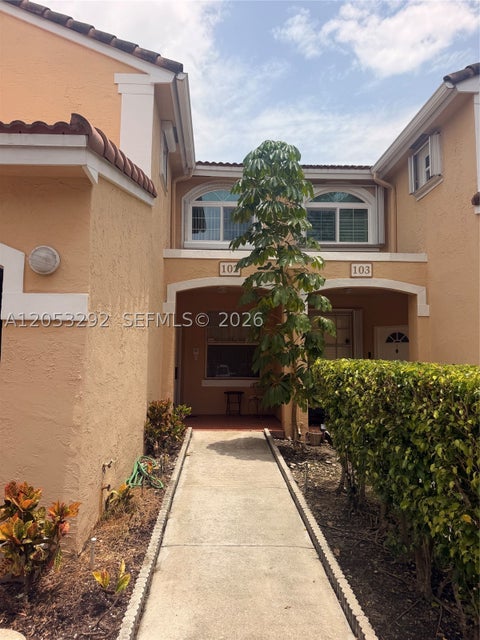Photo of 14817 Balgowan Rd #102-5, Miami Lakes, FL 33016 (MLS # A12053292)