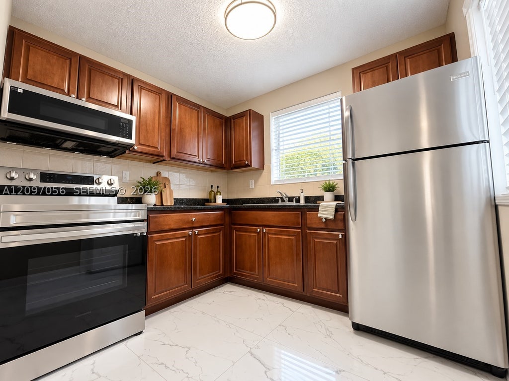 Photo of 616 SW 14th Ave #205, Fort Lauderdale, FL 33312 (MLS # A12097056)