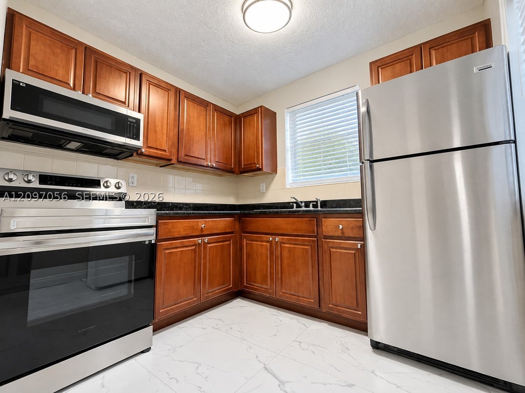 Photo of 616 SW 14th Ave #205, Fort Lauderdale, FL 33312 (MLS # A12097056)