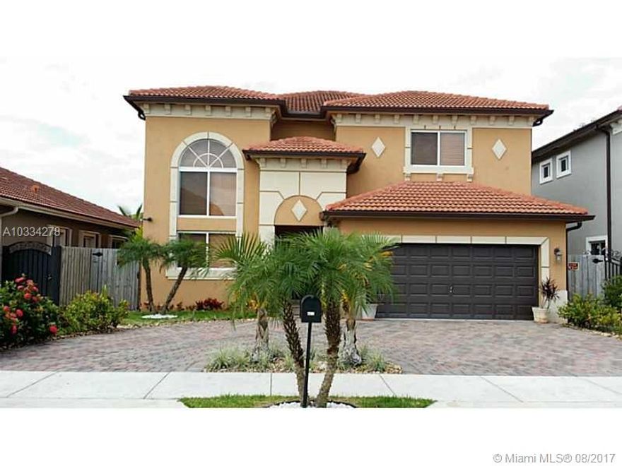 Ravishing property rarely found so close to Bird Rd. It showcases 5 bed/4bath including main & secondary masters + Jack&Jill,roman tub and double sinks in master room. Built in 2012, this Mediterranean home boasts circular driveway,2 A/C units,barrel roof,granite counters in kitchen & bathrooms,SS appliances,double height ceilings,attractive staircase w/loft landing & extra storage beneath stairs,no HOA & elegant light fixtures. Gorgeous patio includes salt water pool,mature palm trees,decorative stones for minimal maintenance, open terrace & pool deck made of pavers. Call listing agent directly for showings.