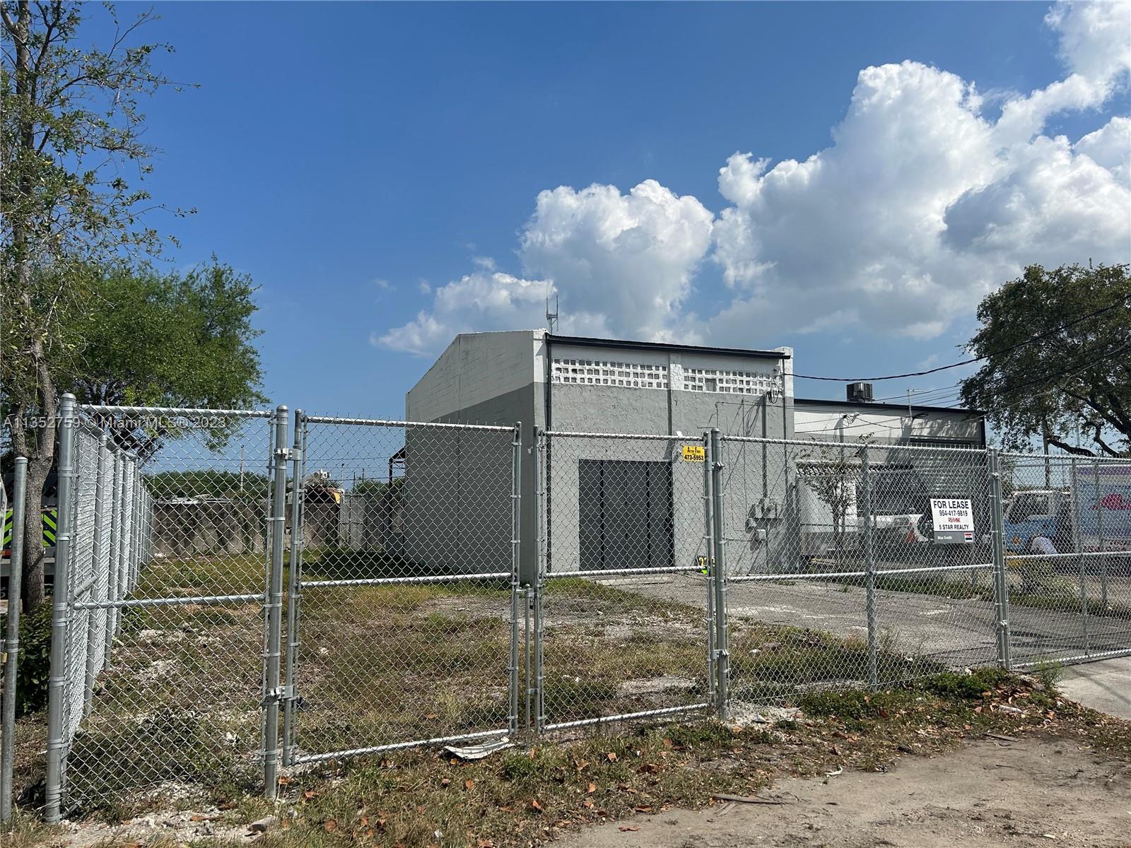 Free standing industrial building on a 5,400 sq ft lot in West Park for lease. Completely fenced in Property with heavy steel doors to the warehouse. Perfect storage yard for heavy equiptment. 10' ceilings'. The site is zoned TOC, and allows for many types of commercial/induatrial uses. Vacant and available now.