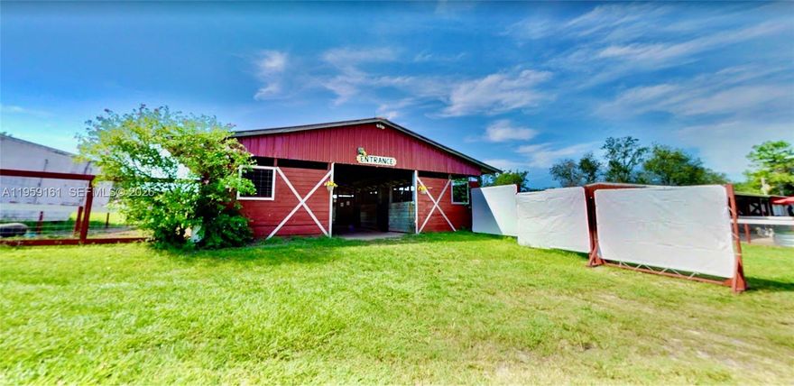 Income-producing agricultural and community business property situated on 7.58 acres in unincorporated Marion County with direct frontage on W Highway 40. The land is improved with extensive animal and agricultural infrastructure, including multiple barns, stalls, paddocks, perimeter fencing, carports, and related support structures, allowing for immediate use without the need for ground-up development.

A 3-bedroom, 2-bath manufactured residence is located on site, suitable for owner occupancy, staff housing, or operational support. The property is currently configured to support animal-based and recreational agricultural uses and offers flexibility for a variety of owner-user or investment strategies.

Zoning includes A-1 General Agriculture with a confirmed B-2 Community Business component, providing flexibility for commercial and community-oriented uses. Paved road access and high visibility along Highway 40 further enhance accessibility and exposure.

This offering presents an uncommon combination of acreage, existing improvements, zoning flexibility, and highway frontage in a single property. Buyer to verify permitted uses and financial information.