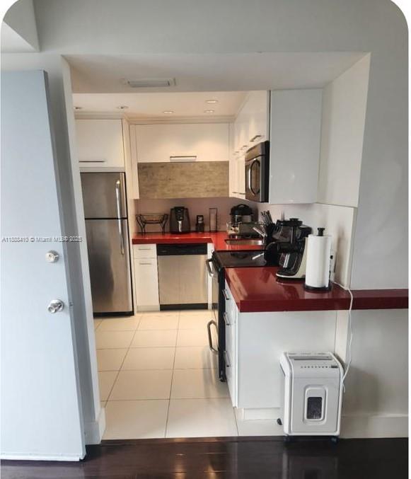 ENSENADA CONDO BLDG E-II - Residential Lease