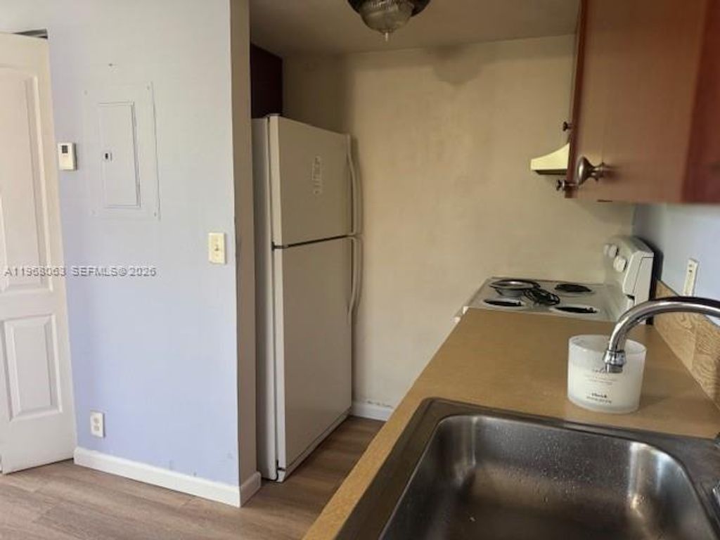 Photo of 2046 NW 43rd Ter #8, Lauderhill, FL 33313 (MLS # A11968063)