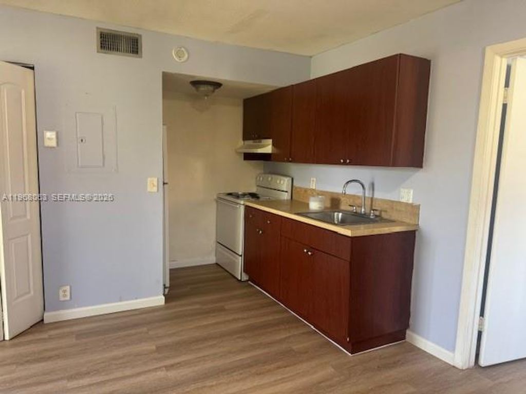 Photo of 2046 NW 43rd Ter #8, Lauderhill, FL 33313 (MLS # A11968063)