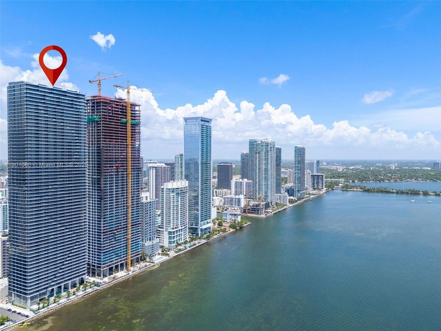Live above the bay at Aria Reserve, Edgewater. New construction 2BR + Den / 3BA on the 45th floor with direct water views and a huge balcony. Brand-new kitchen, in-unit washer/dryer, split bedrooms with en-suite baths, and a flexible den with a full third bath. Five-star amenities: 2 pools, hot tub, sauna, steam room, pickleball, tennis, padel, basketball, BBQ area, kids’ playground, and more. Unbeatable Miami location close to the Design District, Wynwood, and Brickell. 2 garage parking lot.