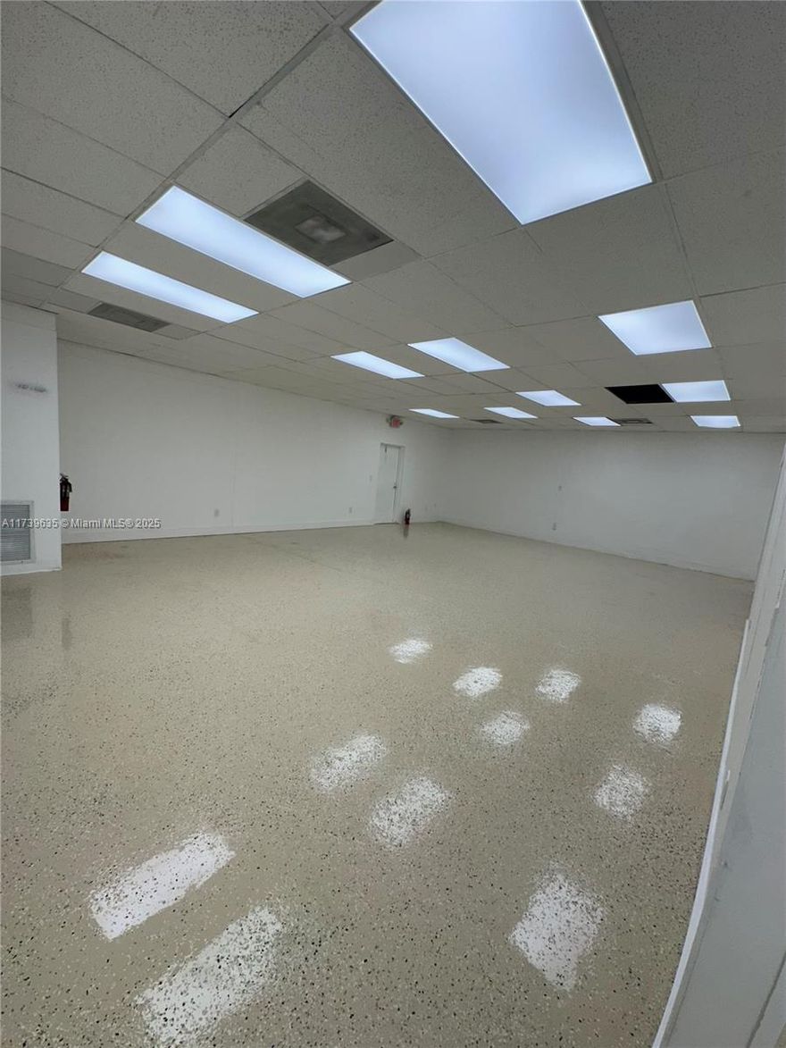 Commercial building with multi-purpose use, industrial, commercial, civic, or educational. Could be used for offices, restaurant facility, recording studio, bar, warehouse, gym, professional office, many uses! Plenty of exterior parking. Kitchen, bathroom stalls for both men and women. Completely renovated interior, a must see!