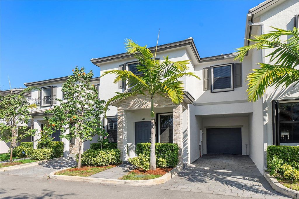 Photo of 1541 SW 28th St #1541, Fort Lauderdale, FL 33315 (MLS # A12018951)