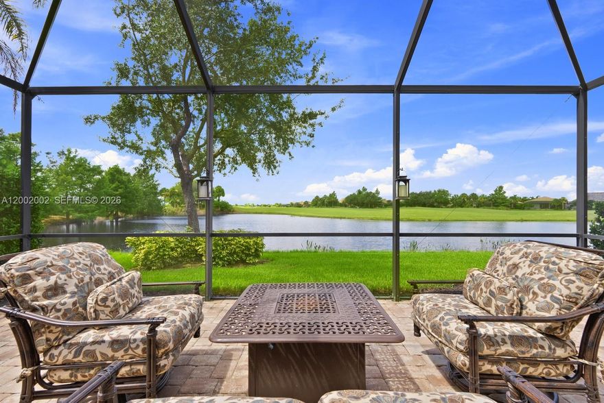 Perfectly positioned on the WATER and 12th FAIRWAY of Panther Run Golf Course, this beautifully upgraded home is located in the 55+ Del Webb Naples community. Featuring the popular TIFTON floor plan, similar to the Mystique, this residence offers 2 bedrooms + den, an EXTENDED great room, and an open layout designed for comfortable living and entertaining.

The GOURMET KITCHEN is the centerpiece of the home with a large island, upgraded appliances, custom cabinetry with pull-out drawers, and a lifetime Granite Shield warranty on the countertops. The spacious den provides flexibility for a home office, guest space, or hobby room.

Interior upgrades include CROWN MOLDING, TILE and CORTEX flooring, and PLANTATION SHUTTERS throughout. IMPACT-RESISTANT WINDOWS and DOORS plus an ELECTRIC HURRICANE SCREEN on the lanai offer added protection and peace of mind.

The PRIMARY SUITE features dual vanities, a walk-in shower, and generous closet space. The TANDEM GARAGE provides room for a golf cart, extra storage, or workspace. Recent updates include a newer A/C, water heater, Bosch dishwasher, and LG washer and dryer.

Optional golf memberships are available at Panther Run Golf Club. Del Webb Naples offers resort-style amenities including pools, fitness center, pickleball, tennis, bocce, dining, and golf cart access to nearby shopping and dining.