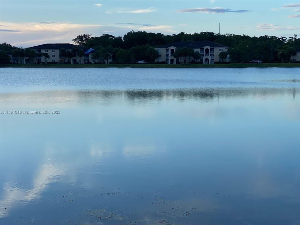 Photo of 5061 Wiles Rd #106, Coconut Creek, FL 33073 (MLS # A11451916)