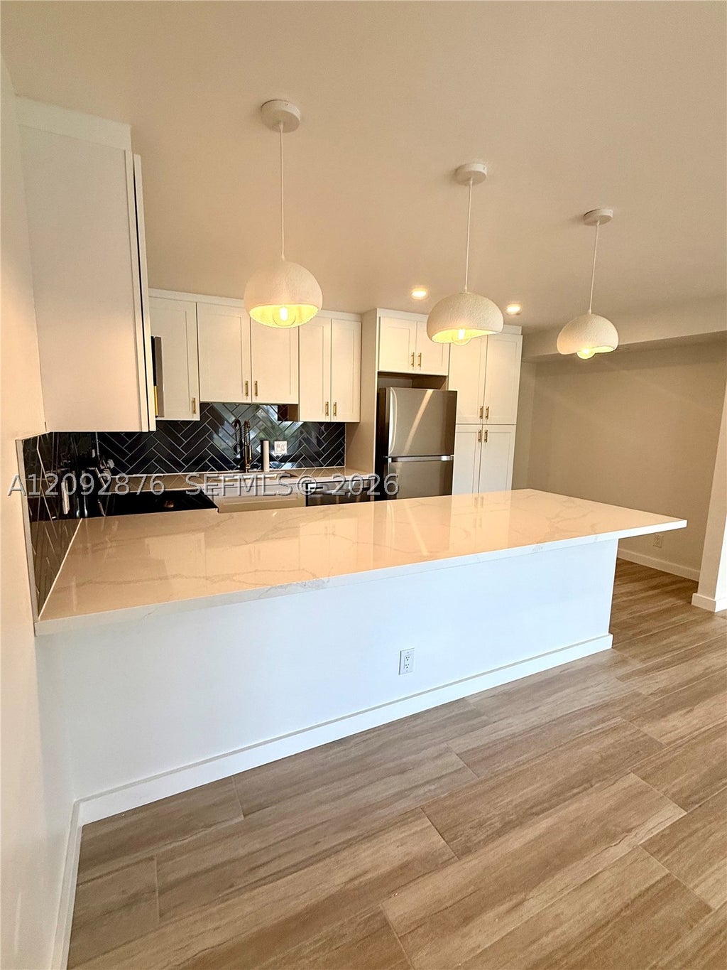Photo of 1116 Green Pine Blvd #D1, West Palm Beach, FL 33409 (MLS # A12092876)