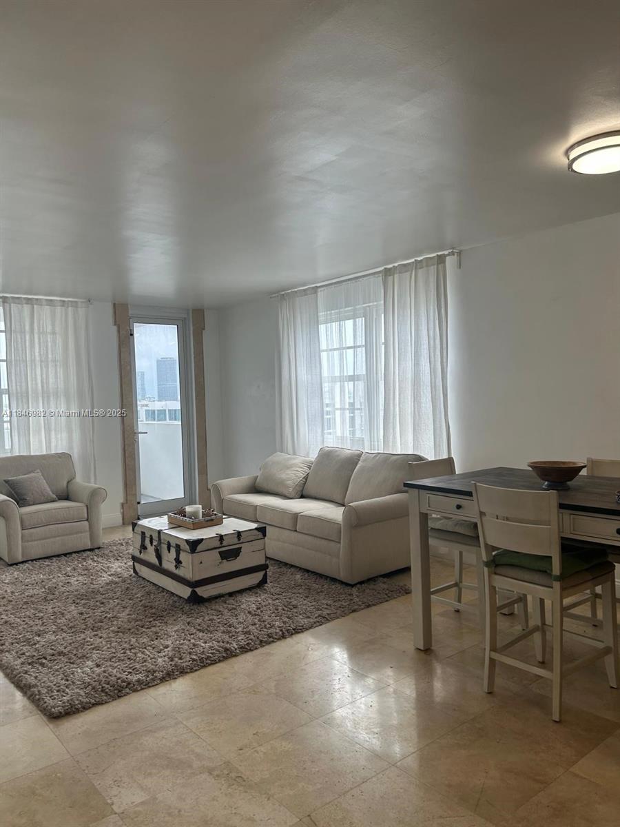 Experience luxury living in this exquisite furnished 2-bedroom, 2-bathroom condo . This stunning unit spans approximately 1,190 square feet and boasts custom closets, soundproof windows, and a private balcony with breathtaking city views. The modern kitchen is designed with stainless steel appliances, including a dishwasher, oven/stove, and refrigerator. Convenience is key with an in-unit washer and dryerResidents can indulge in top-tier amenities such as a heated infinity pool, state-of-the-art gym, media/game rooms, and a laundry facility. Enjoy the convenience of 24/7 security, concierge services, doorman, 1 Space valet parking, and a bike room. This is an opportunity to enjoy a sophisticated lifestyle in the heart of Miami Beach.