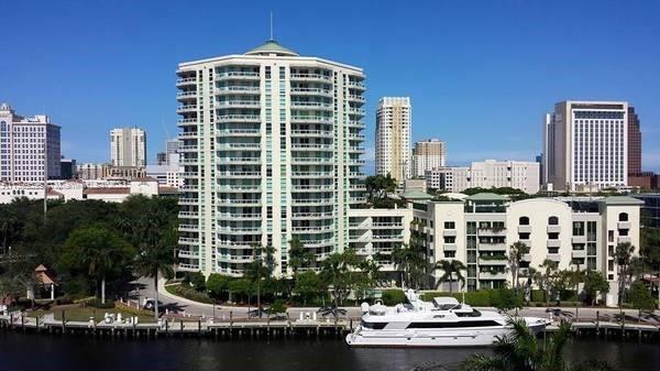 FTL downtown living at its finest! Spectacular views of the New River and River-walk for this 2 BR/2 BA in The Esplanade, a luxury residence across from the Broward Center for the Performing Arts. Features include an oversized terrace with river and skyline views, primary bedroom with walk-in closet and jetted tub, impact windows, built in closets, 2 reserved parking spaces and more. Full size Washer/Dryer, updated kitchen w/SS appliances and granite countertops. Luxury building amenities include EV chargers, tennis, pickle ball, fitness center, heated pool, spa, sauna, club room, business center and 24 hr security. Enjoy the Riverwalk right outside your door with ready access to Las Olas and the Broward Center. Pet friendly and minutes to the airport, Brightline and all major roads.