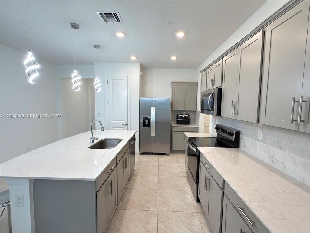 Photo of 8344 NW 7th Pl #8344, Plantation, FL 33324 (MLS # A12004065)