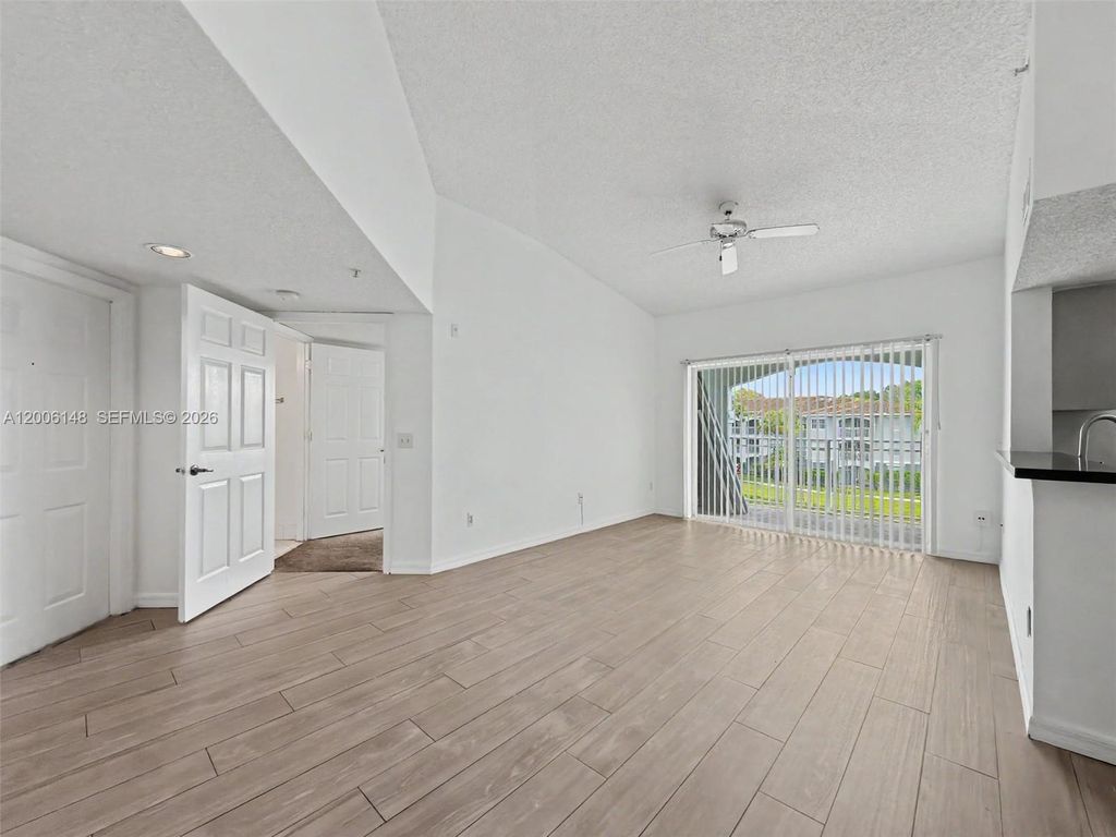 Photo of 9615 NW 1st Ct #10-302, Pembroke Pines, FL 33024 (MLS # A12006148)