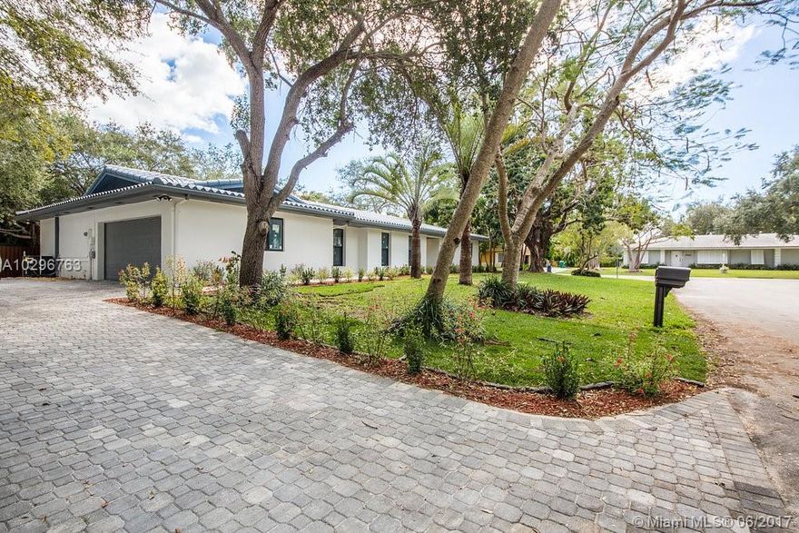 Unique Corner Home in the heart of Palmetto Bay. Totally renovated and refurbished! 3 bedrooms and 3 luxurious European bathrooms, living/dinning area, gorgeous family room with fire place, modern kitchen with quartz tops and new SS appliances. White porcelain flooring throughout, screened terrace and expansive back yard perfect for entertainment. New high impact windows, new roof, new driveway, new fence, new A/C units, new plumbing and electrical fixtures and pool just resurfaced. 2 car garage, large washer and dryer, crown molding, modern lighting fixtures and lamps. Show with confidence! very close to the best schools in the area.