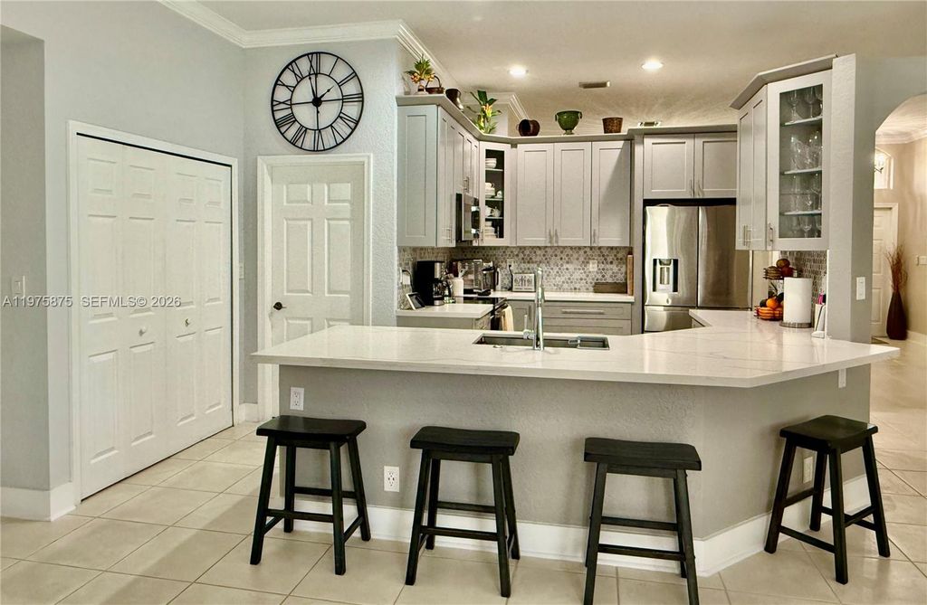 Photo of 1335 E Barwick Ranch Cir, Delray Beach, FL 33445 (MLS # A11975875)