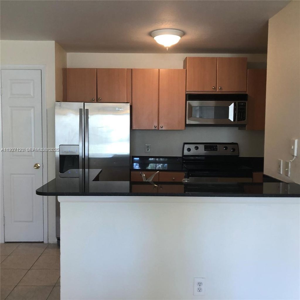 Photo of 1845 Palm Cove Blvd #8-206, Delray Beach, FL 33445 (MLS # A11927120)