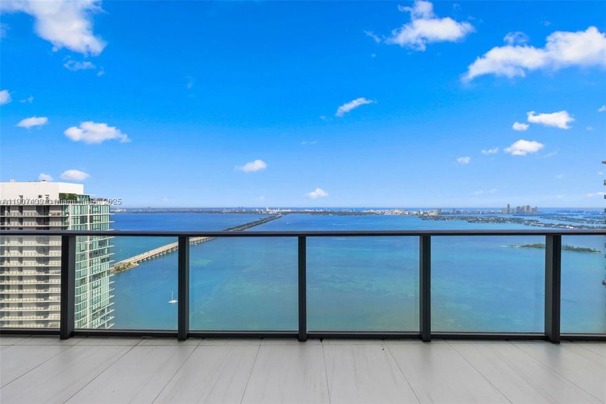 Turnkey, 14 feet ceiling high, furnished penthouse showcasing 3-bedrooms/ 3.5 bathrooms. Enjoy incredible bay views and Miami Beach skyline from an expansive terrace with a private outdoor jacuzzi. This totally remodeled unit boasts 14' ceilings, Italian furniture, custom walk-in closets, solid doors and electric shades. The kitchen features a beveled finish countertop and full Quartzite Supreme backsplash. It comes equipped with high-end Sub-Zero refrigerator/freezer and Wolf appliances. The unit comes with 2 parking spaces. The building features incredible amenities including tennis courts, a bowling alley, resort-style pool, an onsite restaurant, a game room, a spa.