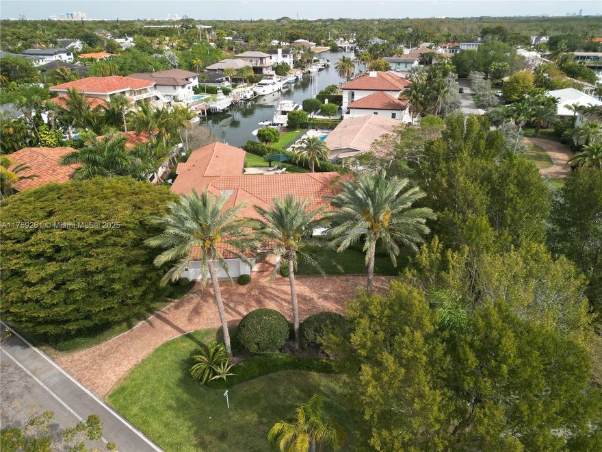 This Sophisticated and elegant residence offers over 5,000 sq ft of magnificent waterfront world class lifestyle at its best. Unobstructed Bay access, 50 feet of waterfront. Nestled in spacious 19,497 sq ft of manicured landscaping. Perfectly located in sought after guard gated Gables by the Sea. 5 BD, 4 BA. Delightfully spacious master bedroom and entertaining areas. Marble and wood floors. Stunning remodeled open eat-in kitchen with magnificent views to inviting secluded waterfront backyard with sparkling pool and roofed patio. Dock and /or lift your boat and enjoy marine lifestyle only a few minutes from the Bay. 2 car garage. Impact windows and doors throughout. Great private and public schools. Gables by the Sea has a fabulous community park to enjoy. Easy to show!