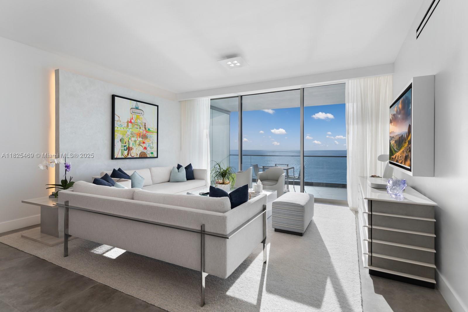 Experience luxury living at Oceana Bal Harbour in Unit 1003N, a stunning residence designed by AD100 interior designer Jamie Drake. This elegant 1-bedroom + den, 2-bathroom apartment offers breathtaking ocean views and abundant natural light from floor-to-ceiling windows, creating a seamless connection to the expansive private terrace overlooking the Atlantic Ocean, perfect for relaxing or entertaining outdoors. Enter through a private elevator that opens directly into an open living area and gourmet kitchen. The primary suite features an oversized walk-in closet and a spa-like bathroom with marble finishes, a soaking tub, and a rain shower. Resort-style amenities include a 24-hour doorman and concierge, beach service, pools, a poolside restaurant, a world-class spa, and 2 storage units.