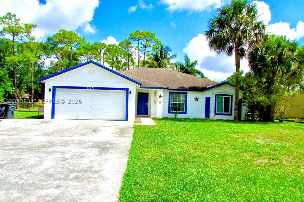 Photo of 13677 Temple Blvd, West Palm Beach, FL 33412 (MLS # A12043632)