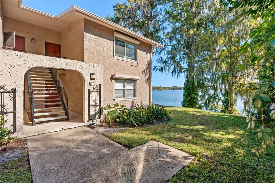 Enjoy stunning sunrises over Lake Howell from this updated 1-bed, 1-bath condo at Marbeya Club. This 781 sq ft home offers lake and wildlife views, plus access to the private boat ramp and dock. This is perfect for boating, skiing, tubing, and paddle boarding. Inside features fresh paint, an updated bathroom, a new electrical panel, brand-new impact windows, and powered hurricane shutters. The screened back porch includes a laundry room, and both front and rear entries add convenience. Community amenities include a lakefront pool and clubhouse. Roofs were fully replaced in 2025. Walk to Publix, restaurants, and local favorites, with quick access to Winter Park, UCF, downtown Orlando, and major attractions. Ideal for a relaxing lake lifestyle or a strong rental opportunity.