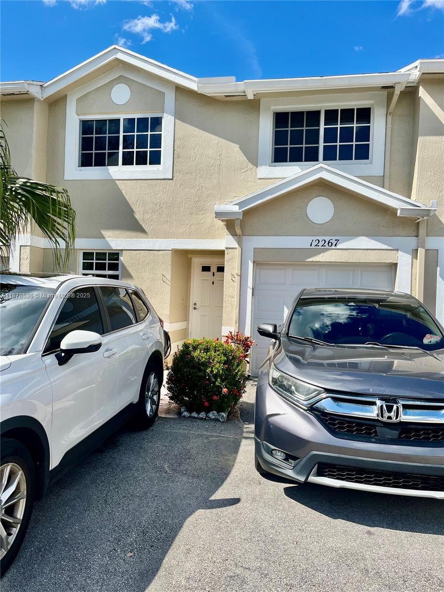 LOCATED IN DESIRABLE FLAMINGO GARDENS 3 bed/ 2.5 Bath TOWNHOME IN COOPER CITY. AVAILABLE FOR OCCUPANCY TODAY !!! THIS LOVELY TOWNHOME OFFERS 1 GARAGE AND 2 PARKING SPOTS, A FENCED BACKED PATIO, AND WOOOD THROUGHOUT THE HOME. ALL BEDROOMS ARE LOCATED UPSTAIRS AND THE HALF BATH IS LOCATED ON FIRST FLOOR FOR GUESTS. WASHER AND DRYER INCLUDED. THE COMMUNITY OFFERS A POOL AND GREAT SCHOOLS. PETS WELCOMED WITH FEE, OWNER APPLICATION BUT NO HAO APPROVAL FOR RAPID MOVE IN!!