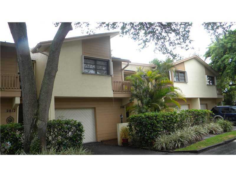 Open and spacious 3/2 1/2 with garage. Granite counters, SS appliances, wood cabinets, lg formal dining room, exceptional closets.Eat in kitchen. Huge Master BR w/ generous sitting area. Fenced yard with wood decking.Hurricane shutters. Unit is larger th an stated on tax role. Priced to sell.