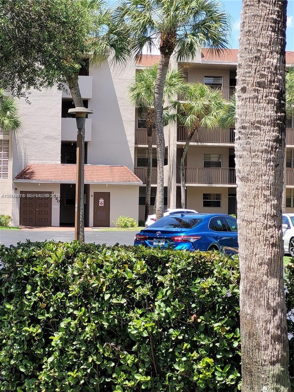 Photo of 1811 Sabal Palm Dr #106, Davie, FL 33324 (MLS # A12009816)