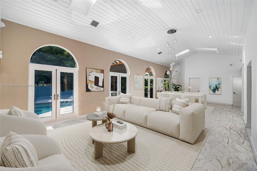 Bay Point is a dream spot for luxury living with a laid-back vibe. This versatile gem offers endless possibilities for customization! Currently boasting 3 spacious bedrooms, an oversized office and den, this home provides the unique opportunity to easily add a 4th or 5th bedroom for whatever your lifestyle demands. Complete with a wet bar, open kitchen, laundry room and high vaulted ceilings in the main room. The spacious backyard is your own tropical paradise including a salt water pool, a large pergola, half-court basketball, and of course, sunshine! ONLY a short hop from Miami’s best shopping, dining, and cultural hotspots as well as MIA & beaches. If you’re looking for a blend of comfort and sophistication in Miami's premiere gated community, this is the place to be.