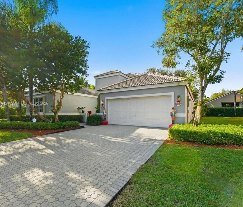 Photo of 2019 Cove Ln, Weston, FL 33326 (MLS # A12002584)