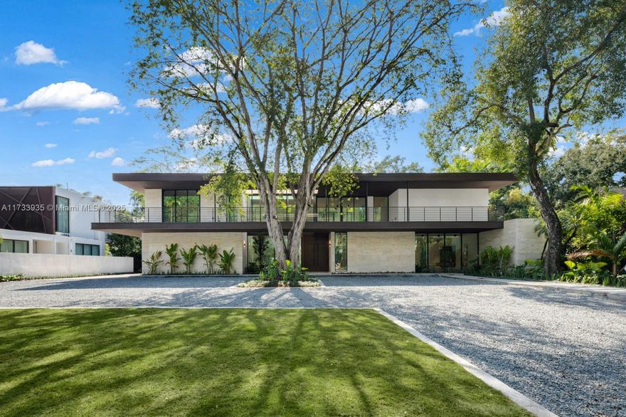 Elevate your expectations in this stunning contemporary masterpiece in the heart of Coconut Grove. With its soaring ceilings and light-filled interiors, every room offers a sense of spaciousness and elegance. The seamless flow from the indoors to the expansive outdoor living area creates an entertainer’s dream—complete with a covered summer kitchen and a tropical heated pool and spa, surrounded by the lush greenery of nature’s finest backdrop.
This home is not just a place to live, it’s a lifestyle. Featuring a private guest house, a fully equipped gym, a movie theater, and an outdoor kitchen cabana, you have everything you need to entertain in style. Experience the perfect blend of luxury, comfort, and nature in this one-of-a-kind Coconut Grove residence. Welcome to your dream home.