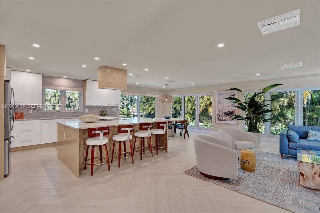 Photo of 1673 Bel Air Ave, Lauderdale By The Sea, FL 33062 (MLS # A11963085)