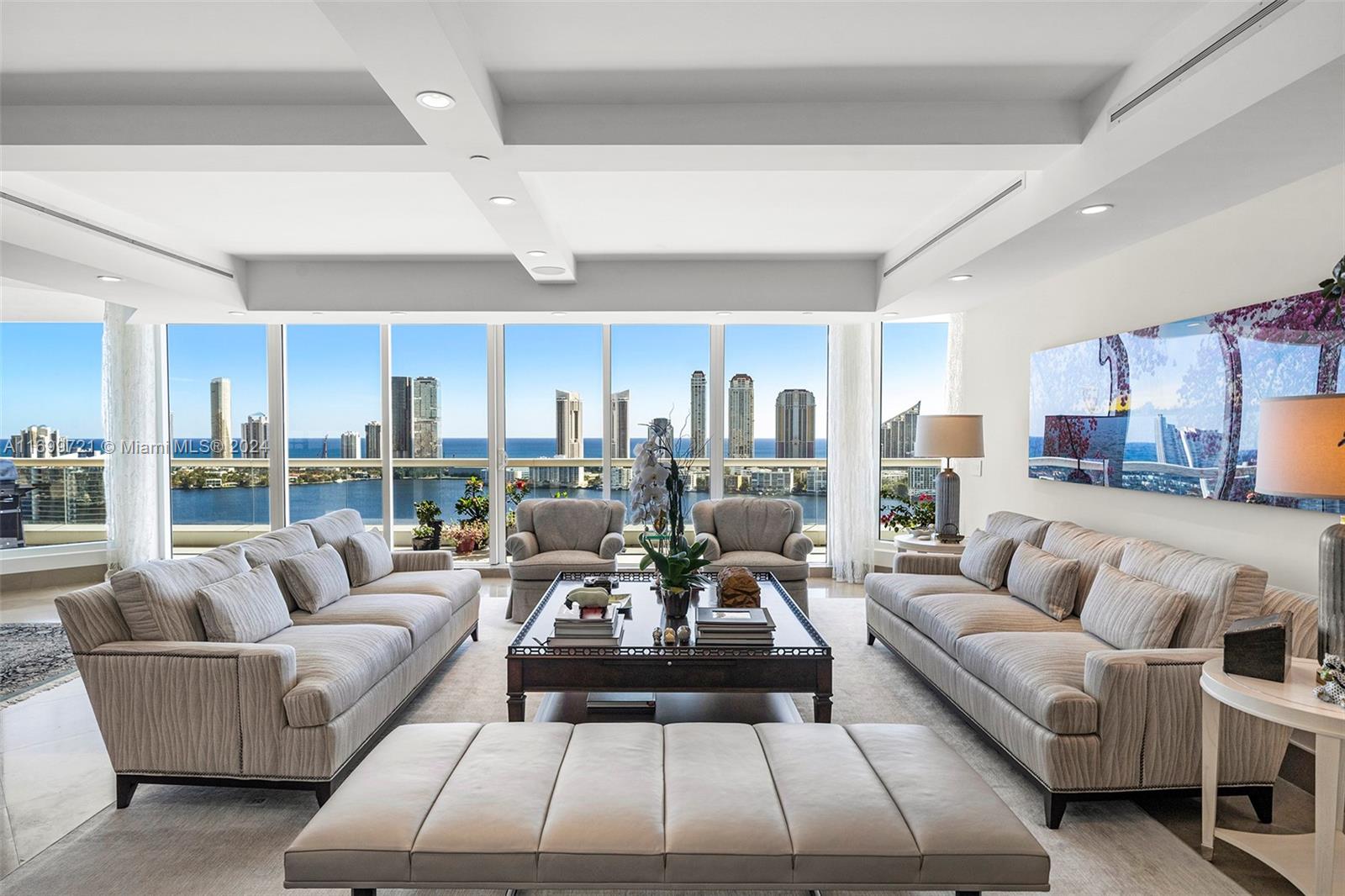 Penthouse-Style Luxury at Bella Mare. This 5-bedroom residence spanning over 4,400 sqft with breathtaking intercoastal and ocean views from expansive terraces.
The unit features a fully renovated kitchen with a modern open island design, perfect for entertaining, as well as renovated bathrooms, including a luxurious primary suite.
The spacious layout includes a grand living area and a cozy family room, ideal for hosting or relaxing. This is a house in the sky! Enjoy Bella Mare’s resort-style amenities, including a pool, spa, state-of-the-art fitness center, private theater, wine cellar, 24-hour concierge, and marina access. Nearby, Williams Island Club offers restaurants, spa, marina, tennis, and pickleball courts. This is luxury living at its finest!