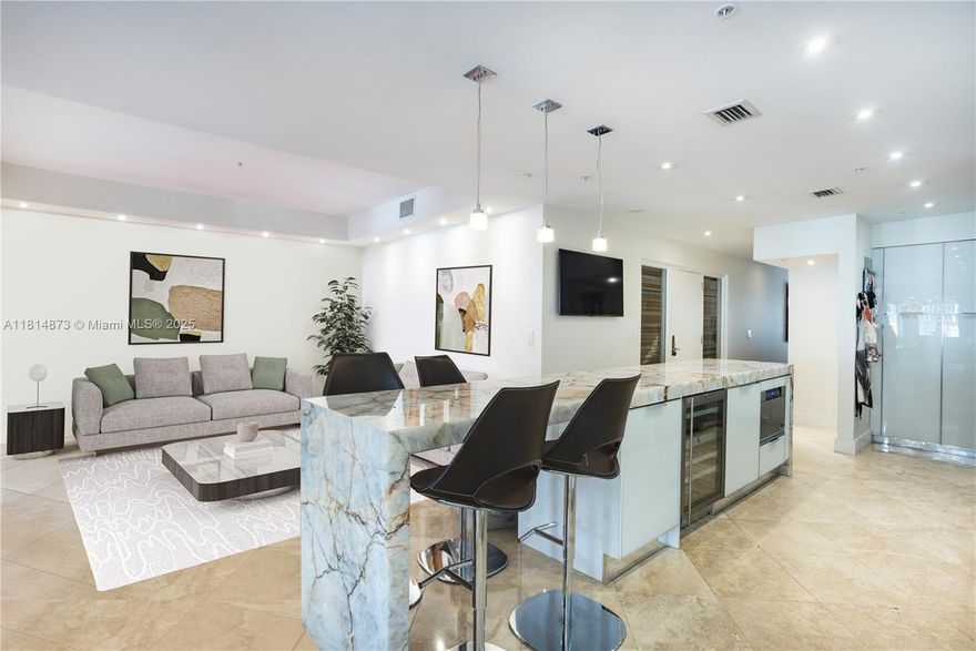 This must see highly sought after spacious Townhouse in the heart of Sunset Harbour. This 3 bed/3 bath Townhouse has over 2,600 sf and has a completely renovated open kitchen floor plan with custom stone counter tops and the highest end appliances by Gaggenau. This property includes two covered parking spaces with a Tesla charging station, and private storage unit in the garage. These Townhomes rarely come to market and are within walking distance to the best Restaurants in town and all of the best fitness establishments.