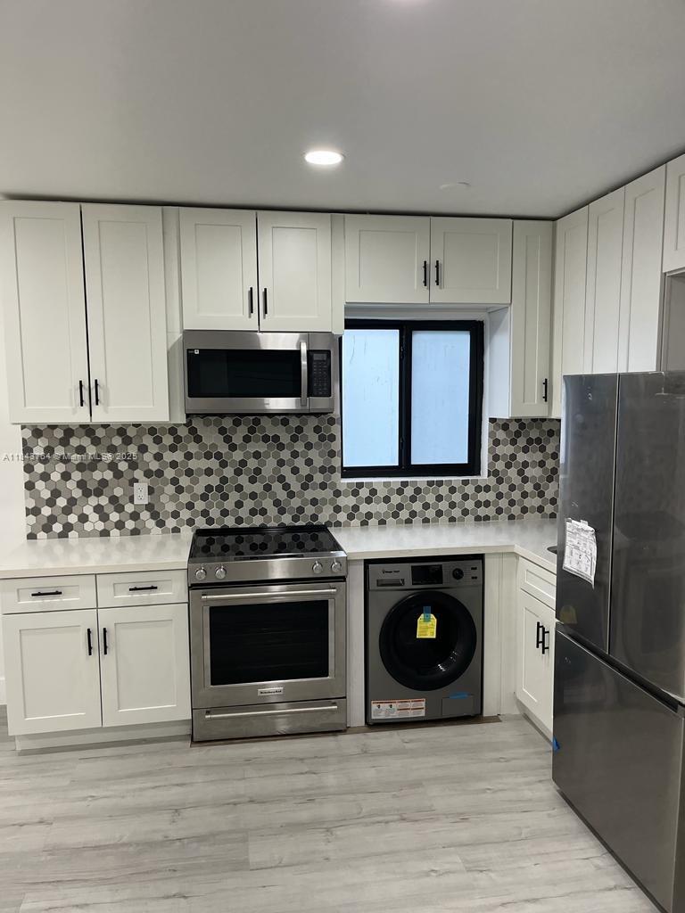 NO HOA!!!! A MUST SEE!!!! A Beautiful Fully Renovated 1 bedroom and 1 bathroom apartment in the heart of Miami Beach vibrant North Shore area!!!! Everything is new from floor to ceiling! Washer & Dryer is included. Close to stores, restaurants. walking distance to the Beach! First, & security deposit to move in! Quick application approval! Easy to show!
