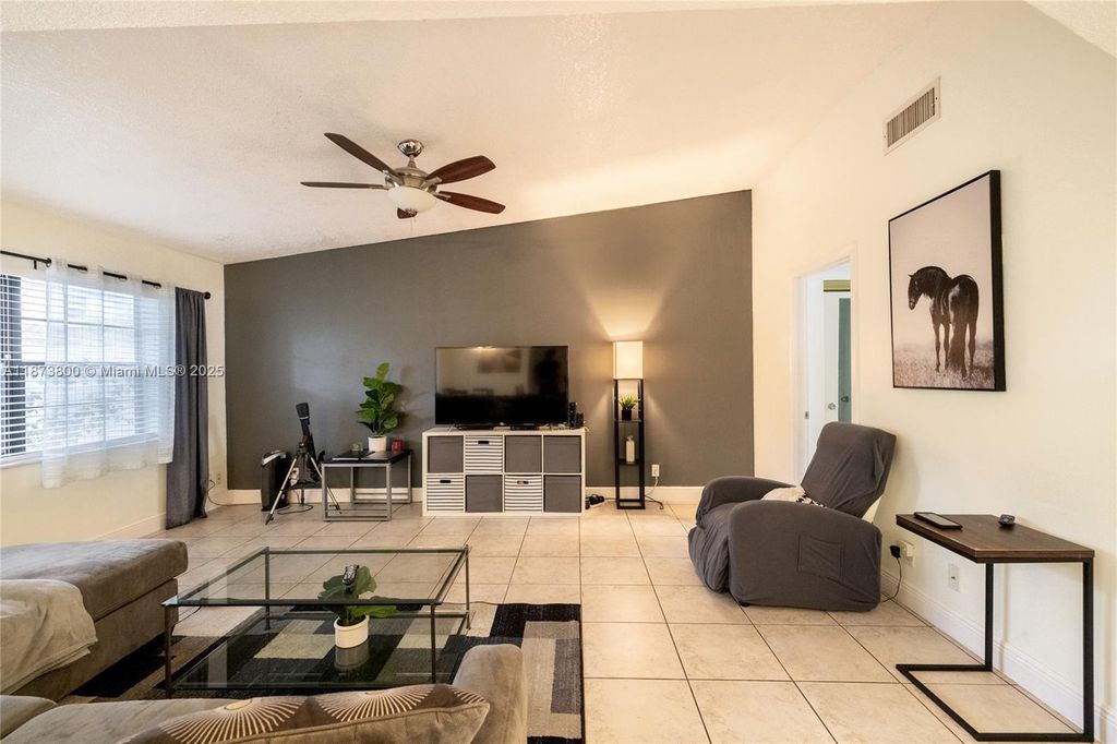 Photo of 10600 La Placida Dr #10600, Coral Springs, FL 33065 (MLS # A11873800)