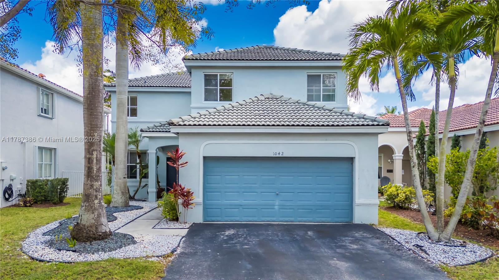 Property for Sale at 1042 Bluewood Ter, Weston, Broward County, Florida - Bedrooms: 5 
Bathrooms: 4  - $949,000