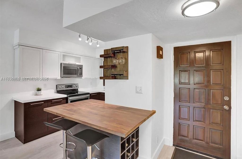 Photo of 6060 S Falls Cir Dr #205, Lauderhill, FL 33319 (MLS # A11939655)