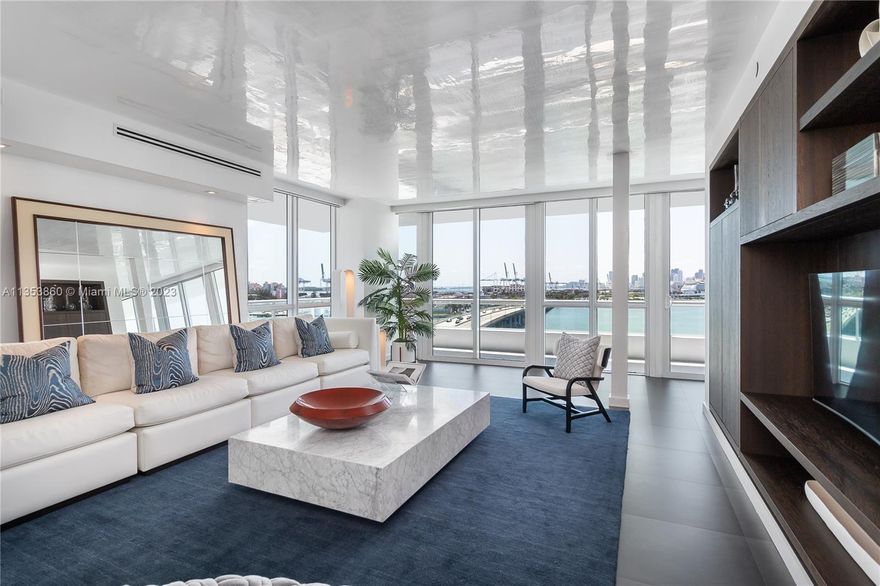 Fully renovated and converted from a 3 bedroom into a more spacious 2 bedroom and  2 1/2 baths , sleek and chic residence with an abundance of natural light coming in. Wraparound terrace, floor-to-ceiling windows. Skyline views over the city, ocean and bay. Beautiful kitchen with and additional wall of storage. Master bathroom with rainfall shower and built walk-in closet. A+boutique luxury building with 24-hour security, valet, concierge, new equipped fitness center, heated pool, sauna and steam room. Close to all but quietly located. New Wajer marina behind the building. Across the street a brand new park opened.